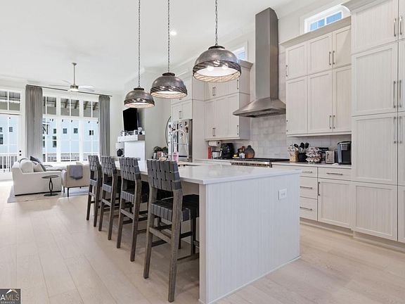 Kitchen extending toward the living space
